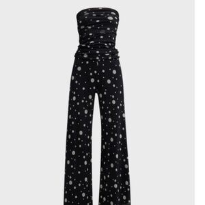 Fuzzi black jumpsuit with white polkadots size L
